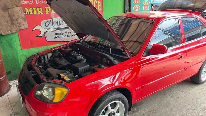 Perbaikan radiator dan dinamo mobil di bengkel Amir Putra Service